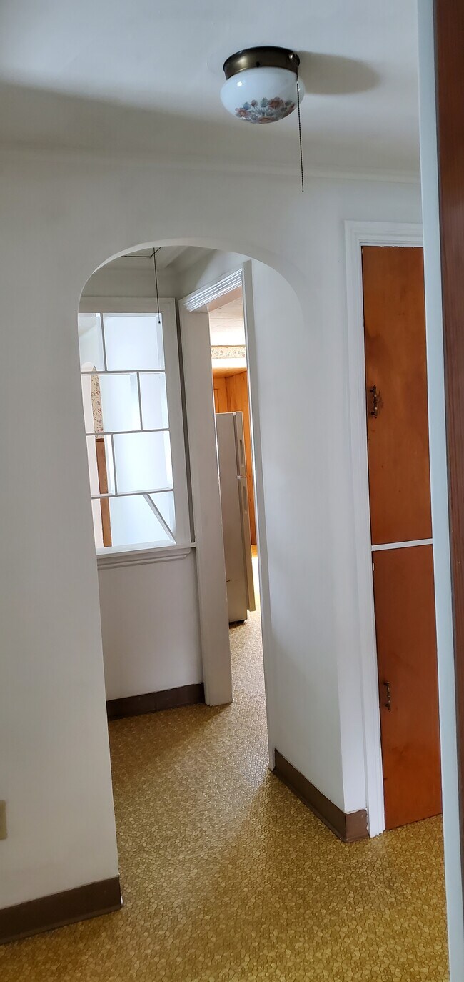 Charm of Built in linen closet and display shelves between the bedrooms and Living room - 15 Francis Ave