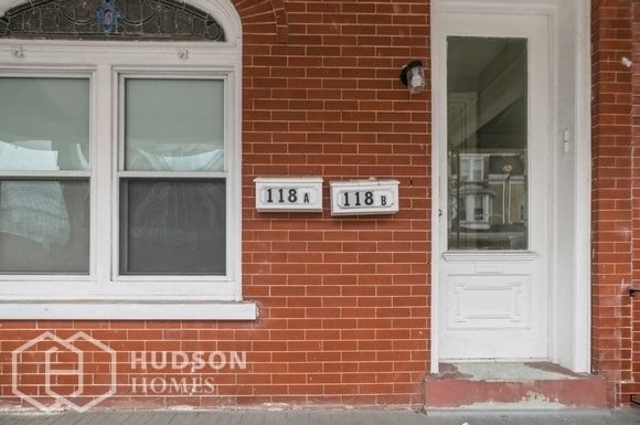 Building Photo - NOW AVAILABLE! - 118 North Madison Street ...