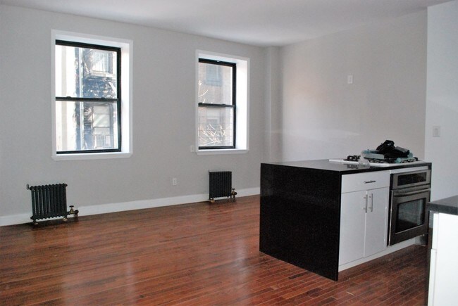 Foto del edificio - 239 W 116th St
