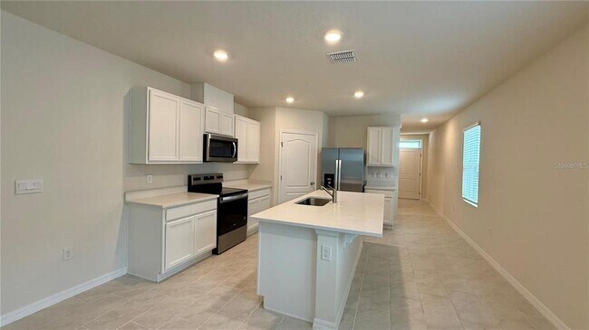 Foto del edificio - 3314 Pine Lily Ave