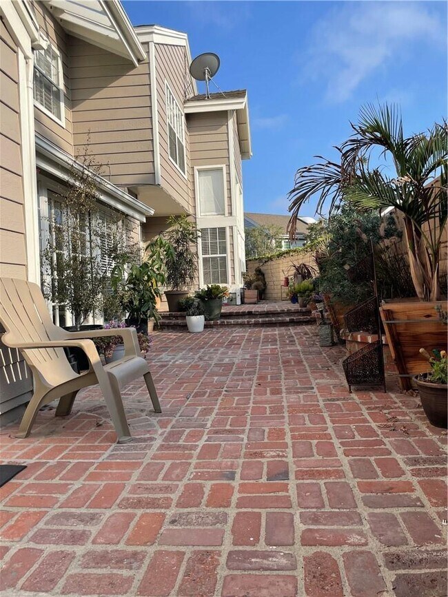 Private Patio. Wraps around the house, with beautiful landscaping drenched in sunlight - 13080 Mindanao Way