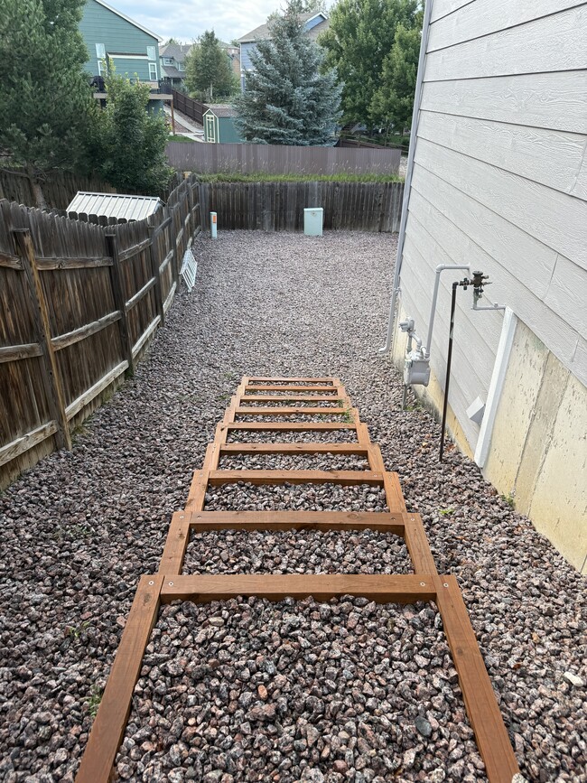 New landscape timber steps - 7153 Arrowroot Ave