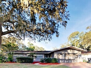 Building Photo - 7102 Woodfield Dr