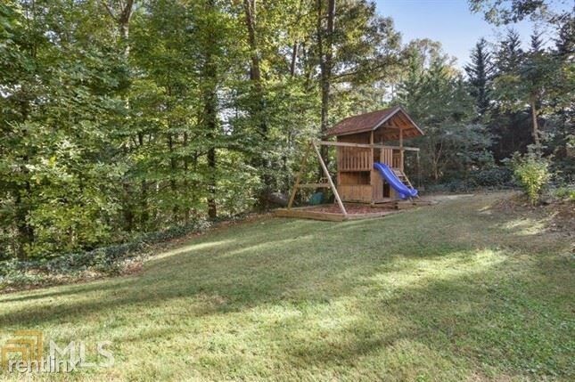 Building Photo - 5 br, 3 bath House - 3400 Camelot Dr