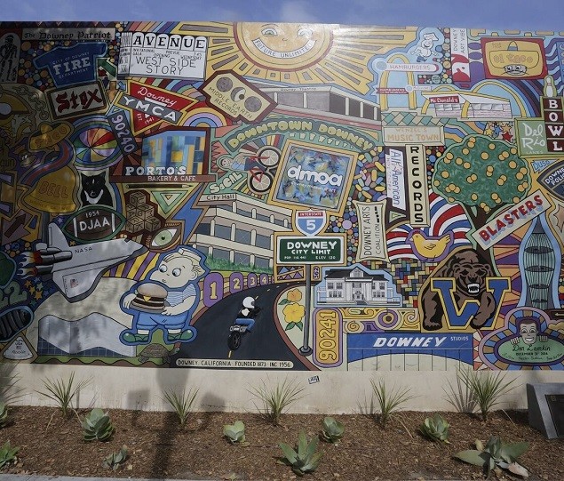The "Downey Doodle-icious" public art mural is located near Porto's Bakery
