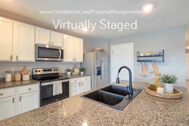 Building Photo - OUTSTANDING 3 BEDROOM/2 BATH FULLY FENCED YARD HOME AVAILABLE NOW! BELLA LAGO PARRISH!