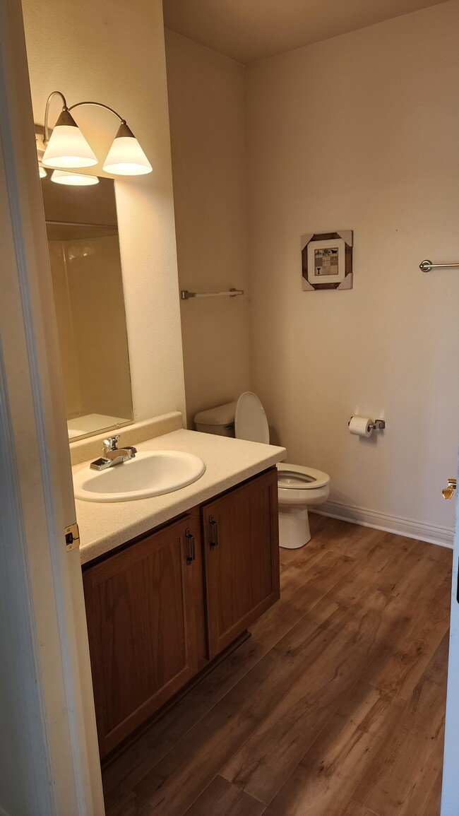 Hall full bathroom outside 2nd bedroom - Uptown Brass Apartments