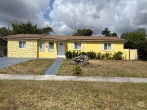 Building Photo - 5911 Barbados Way E