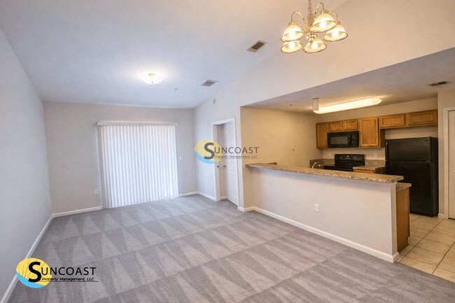 Foto del edificio - 6984 Ortega Woods Dr