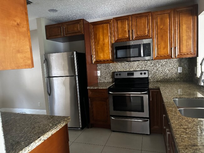 Photo - 8438 NW 40th Ct Townhome