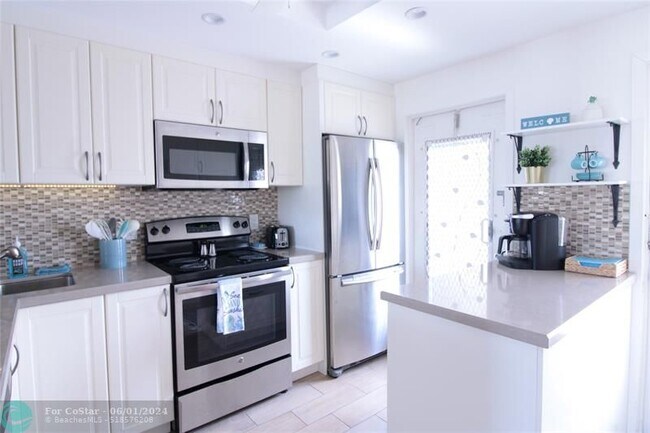 Foto del edificio - 440 Paradise Isle Blvd