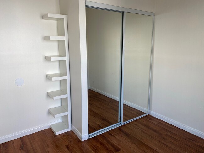 Mirror closet doors in both bedrooms - 104 Breeze Ave