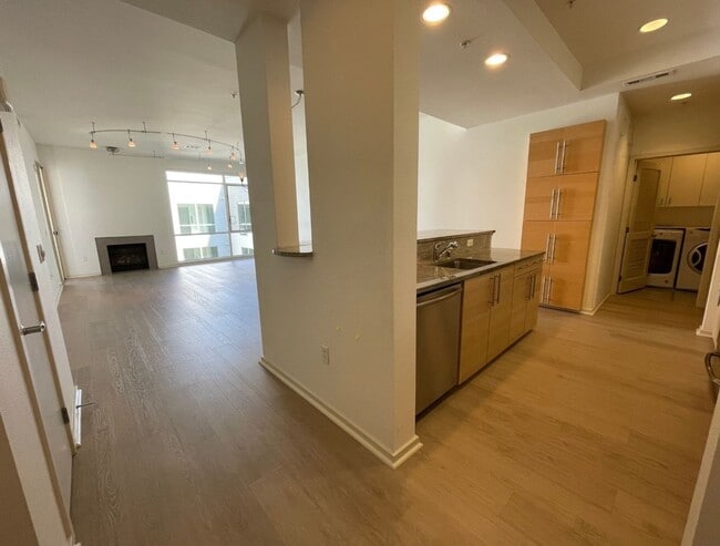 Building Photo - STUNNING Top Floor Two Bedroom Condo in Th...