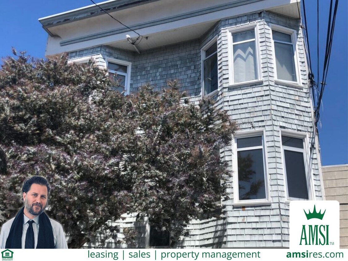 Primary Photo - PRICE REDUCED - Remodeled top floor rent c...