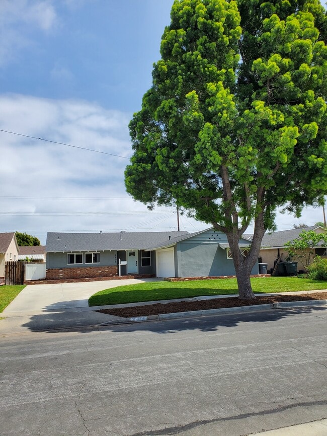 Located in a quiet cul-de-sac with a large front lawn - 8608 Harrison Way