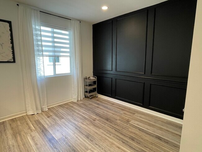 Modern black wainscoting accent wall - 2580 S Escondido Blvd