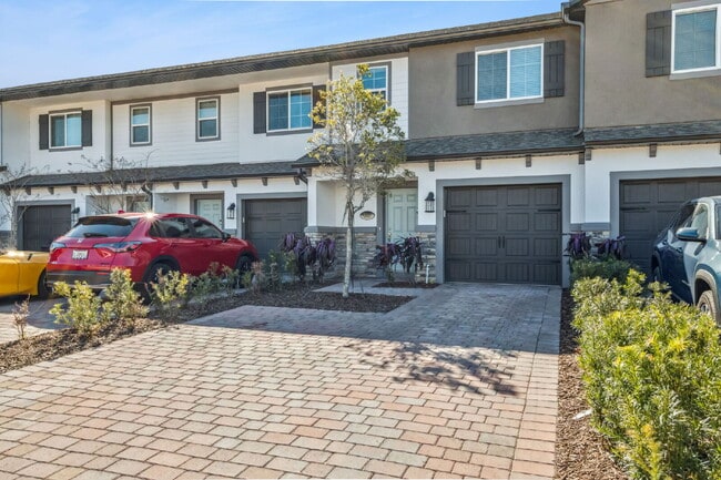 Building Photo - Stunning 3 bedroom, 2.5 bathroom townhome located in a highly desirable gated community