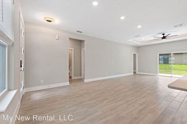 Building Photo - 4 br, 2 bath House - 102 Orchid Court