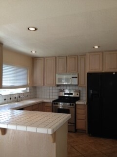 Building Photo - 8705 Shamrock Pl