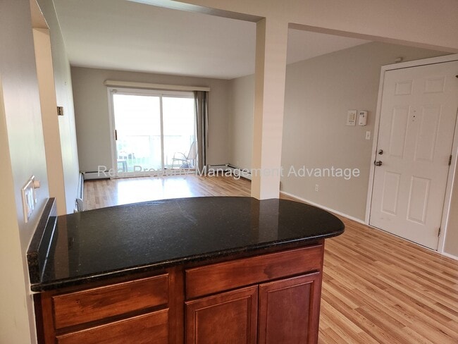 Building Photo - Spacious, Updated Condominium with Two Ful...