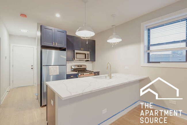 Photo - 4409 N Seeley Ave Apartment