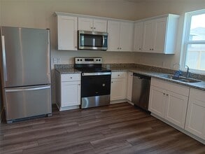 Building Photo - 7837 Pink Dahlia Dr