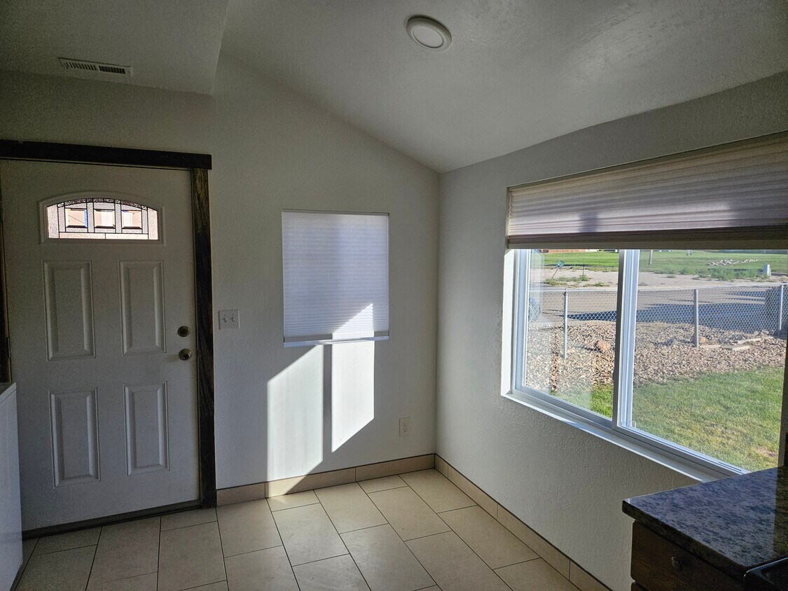Bright kitchen/front door - 721 Dahlia Ave