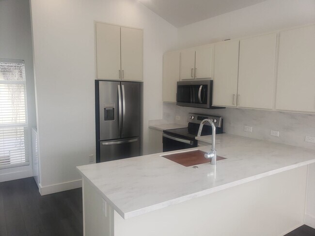Foto del edificio - 5749 11th Ave