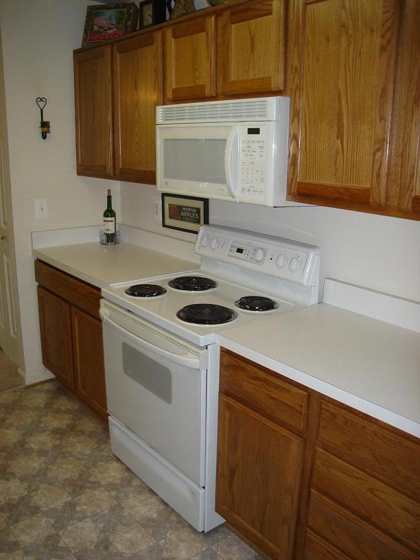 Building Photo - *SUPER BRIGHT UPGRADED CONDO!*