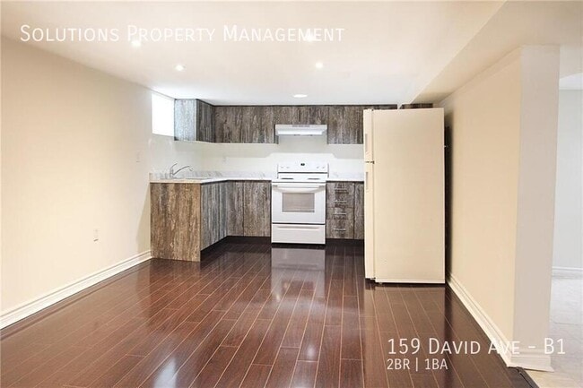 Photo du bâtiment - **2 Bedroom Basement Unit in Prime Location**