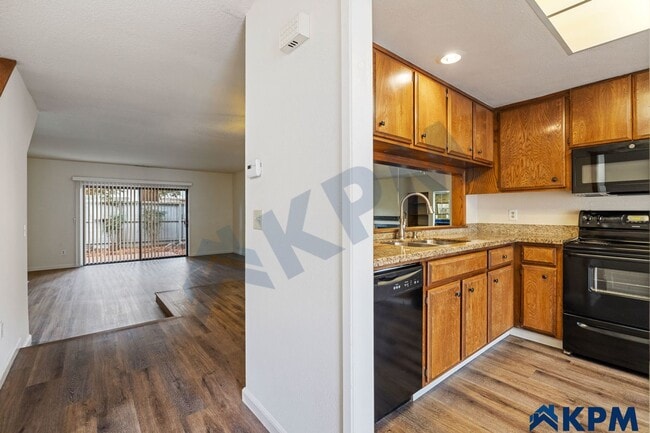 Building Photo - Gated 2-Story 2 Bedroom 2.5 Bath Townhome ...