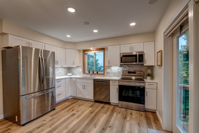 **Photos are of mirror unit with identical finishes and similar backyard** - 213 Parkway Dr