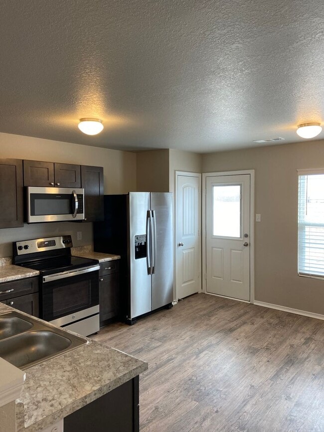 Building Photo - *Preleasing* NEW Three Bedroom | Two Bathr...