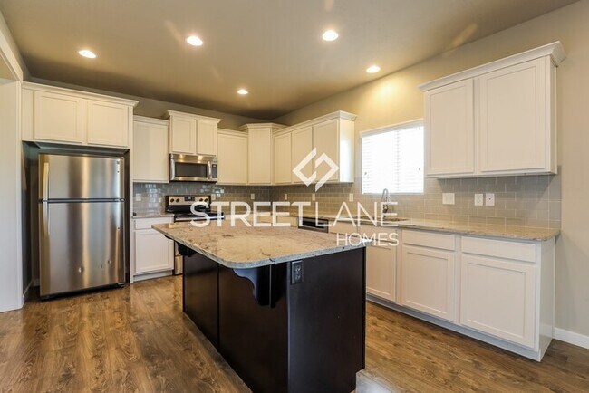 Building Photo - Now offering first full month's rent FREE!!