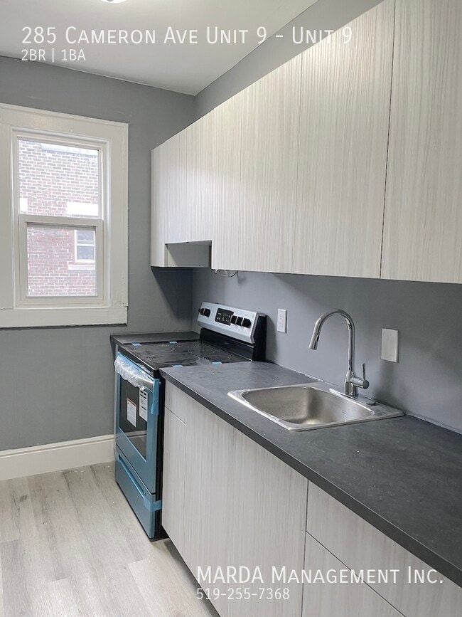 Photo du bâtiment - MODERN 2 BED/1 BATH NEAR UNIVERSITY OF WINDSOR + HYDRO!