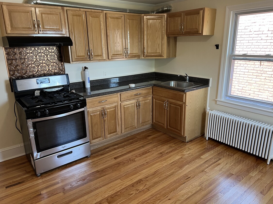 Large eat in kitchen with new appliances - 154 Grand St