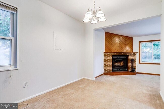 Building Photo - Expanded Pimmit Hills Rambler with Family ...