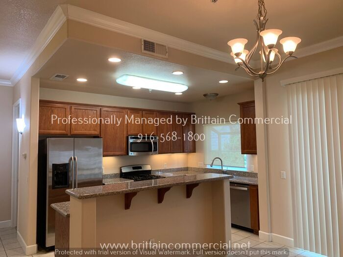 Primary Photo - Luxury Condo, 2 Car Garage, Gated Communit...