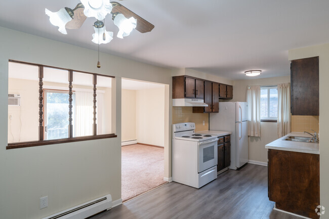 2BR, 1BA - 850SF - Kitchen and Dining Area - Robert and Wright Apartments