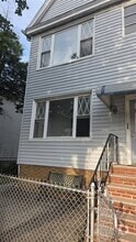 Building Photo - 42-21 65th Pl