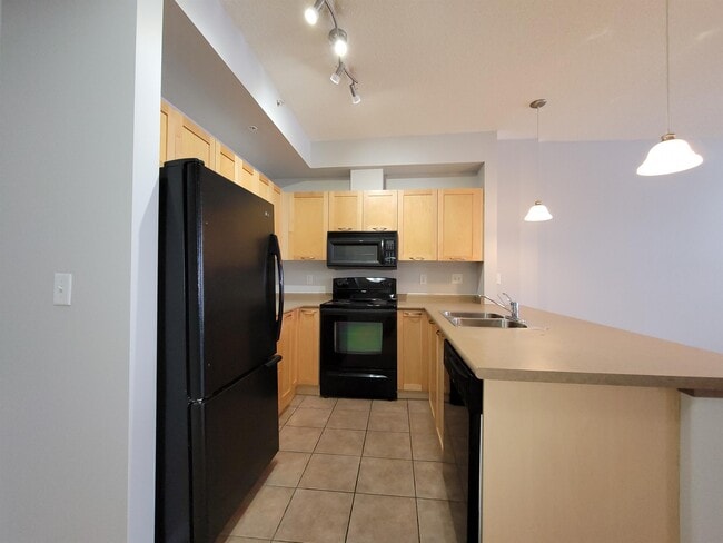 Building Photo - 4245-4139 139 Ave NW