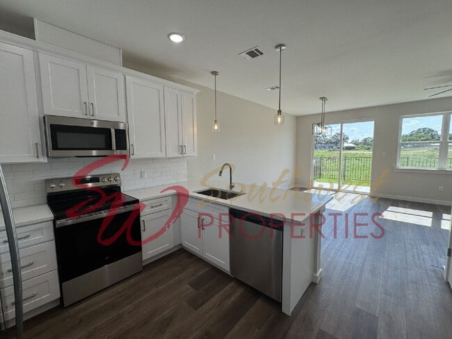 Building Photo - Upgrade your living experience across from campus! 3 bedroom 3.5 bath!