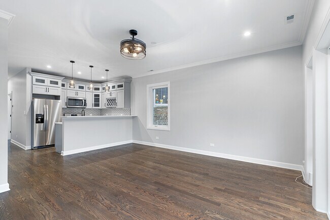 Foto del edificio - 4634 S Langley Ave