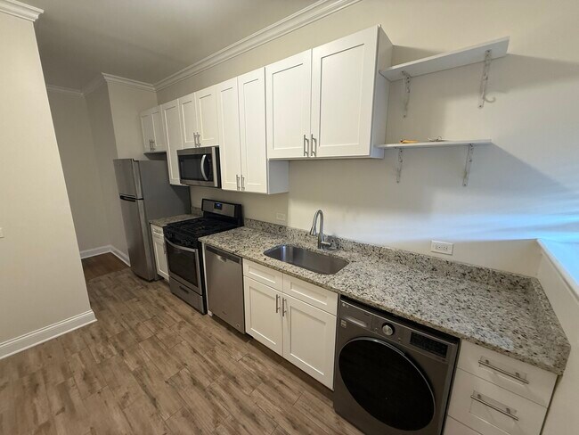 Foto del edificio - 6934 N Lakewood Ave