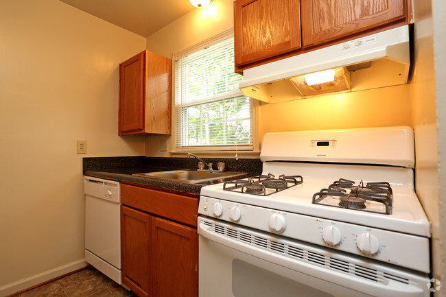 Kitchen - Uptown Apartments