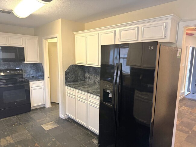 Foto del edificio - 6902 Fawn River Dr