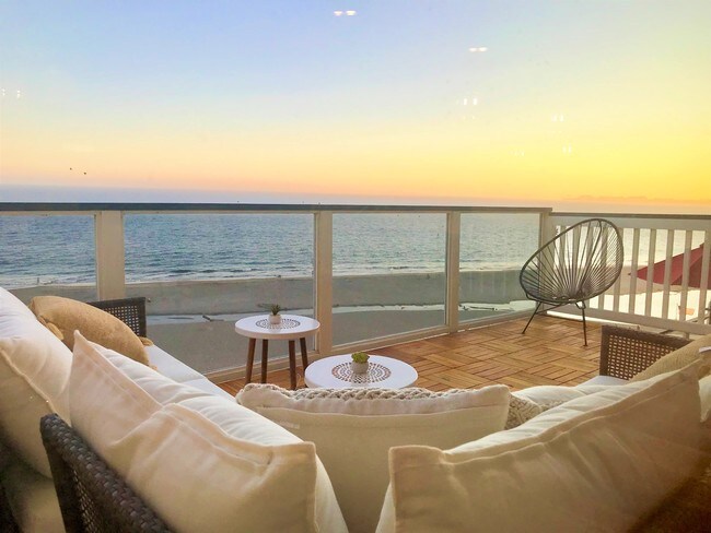 Lounge on the main balcony and watch the sunset every evening. - 122 Rio Del Mar Blvd
