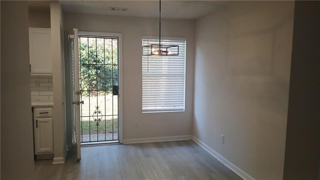 Building Photo - 5677 Wind Gate Ln