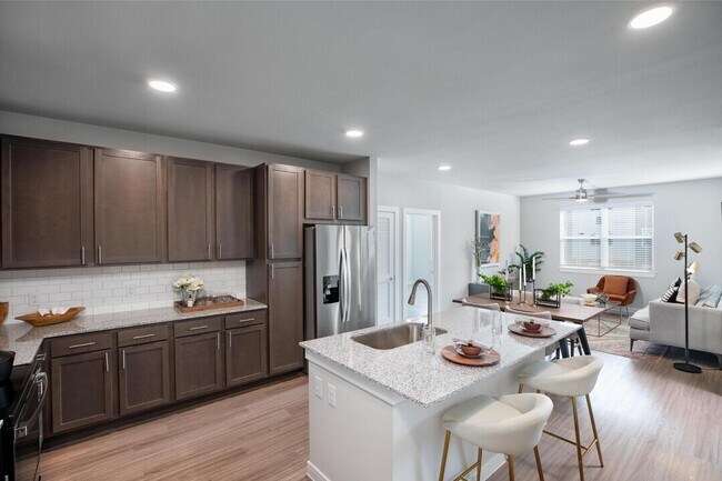 Building Photo - Rents Just Dropped – And We’re Waiving You...