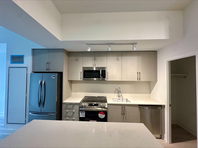 Photo du bâtiment - 2 bedroom rental in new 2025 condo buildin...